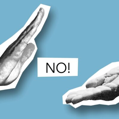 Cutout paper composition representing male showing rejection to outstretched helping hand during negotiations